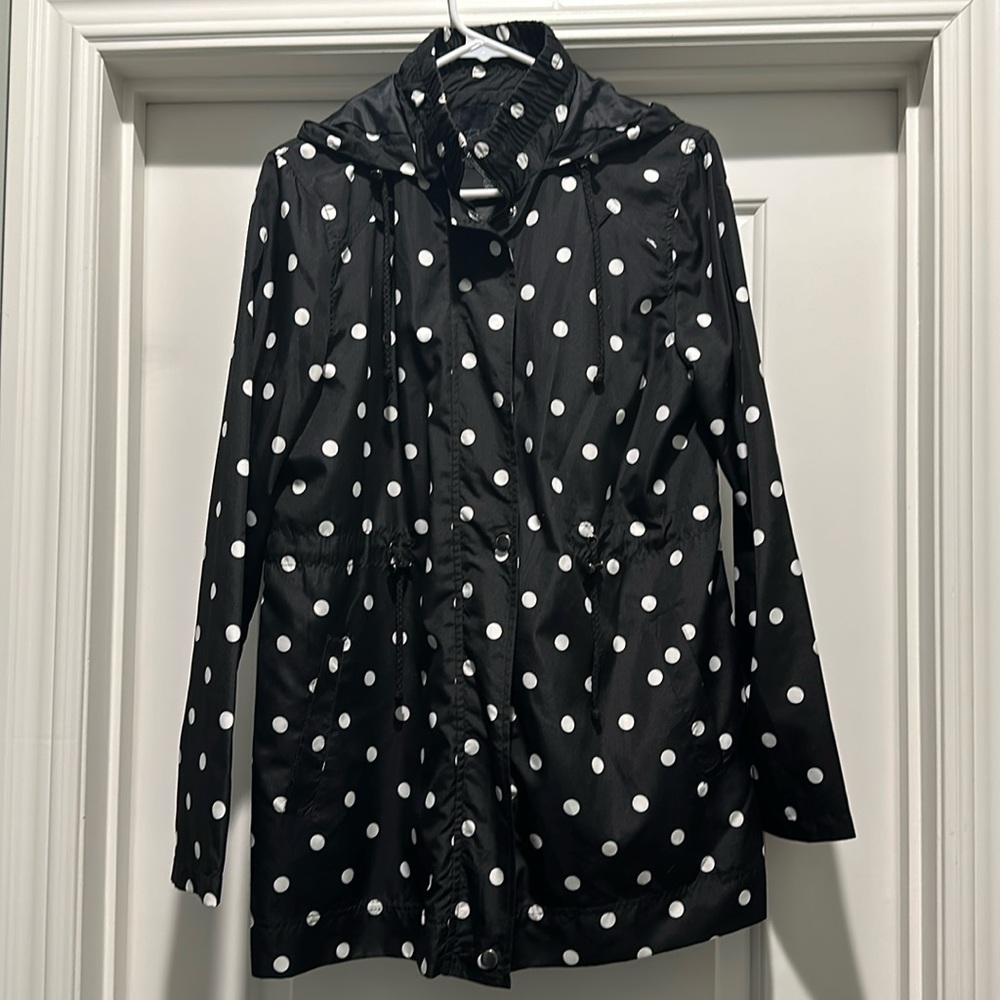 Women’s black and white polka dot rain coat